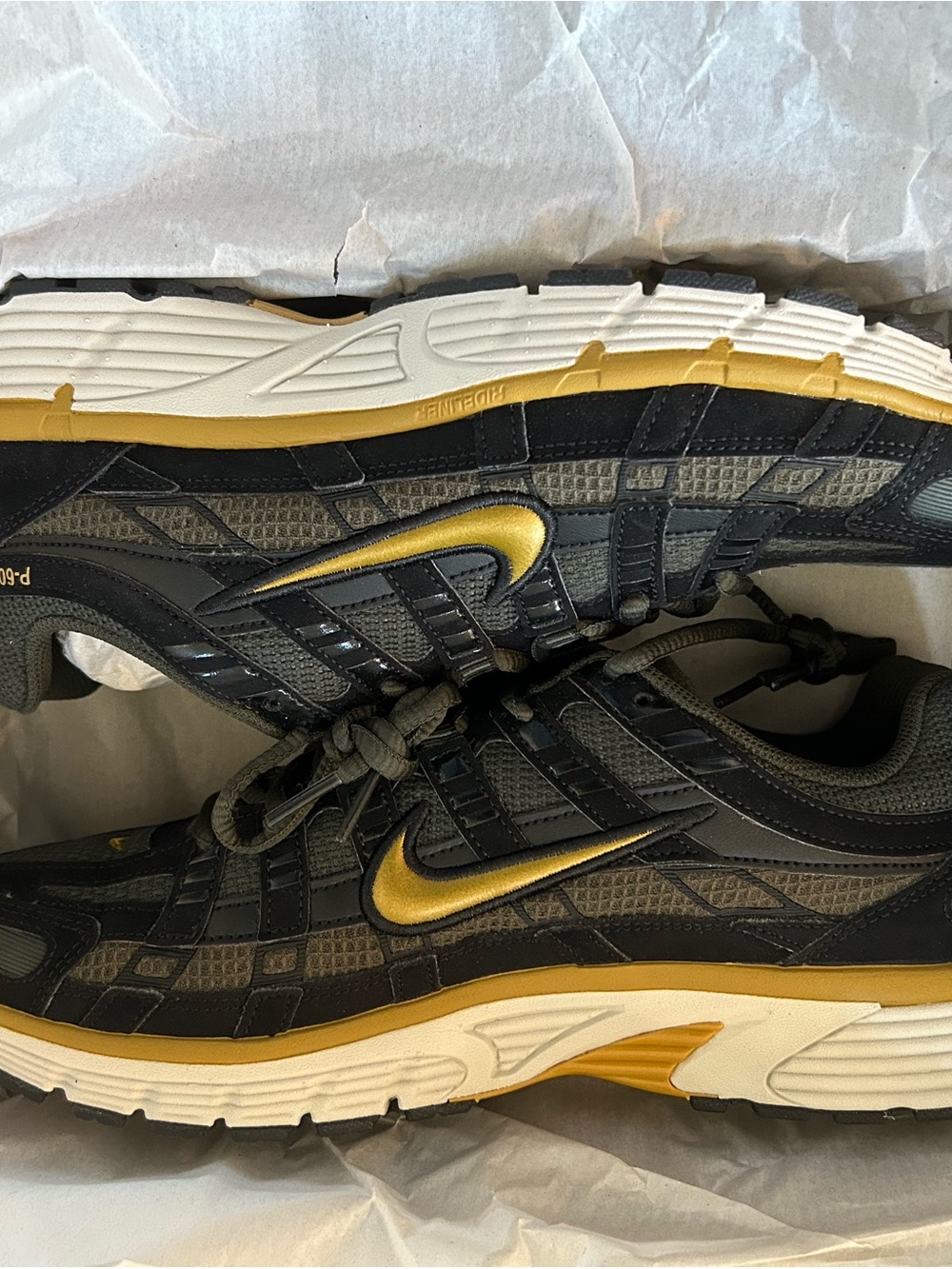 Nike Black and Gold Athletic Sneakers